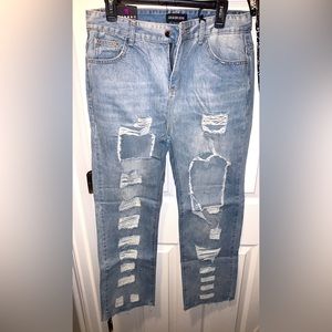 Distressed denim jeans